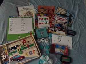 To encourage the linguistic intelligence, it is helpful to have a variety of genres of books, writing materials, and audiobooks.