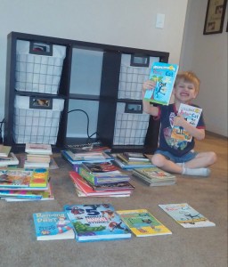 I asked Kona to count the number of books in the family room library. He made stacks of "ten" books and had six books left over. Then he counted the stacks by tens and added the six books. The final tally: 76 books