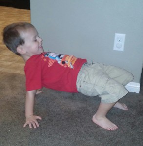 Tahoe is able to hold the Crab Walk position, but still needs to practice crab walking.